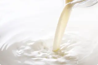 北海道産の新鮮な生乳を使用し、素材本来の美味しさを大切にしたミルクのイメージ